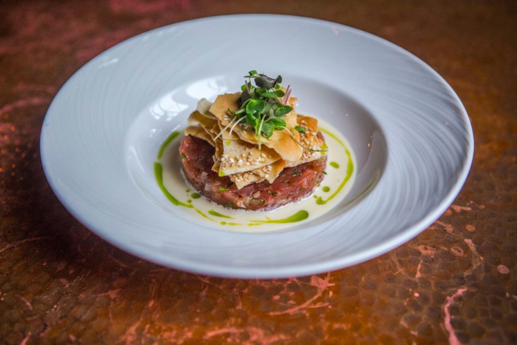 Yellowfin Tuna Tartare with cilantro and sesame crackers served at Bar Charley during happy hour