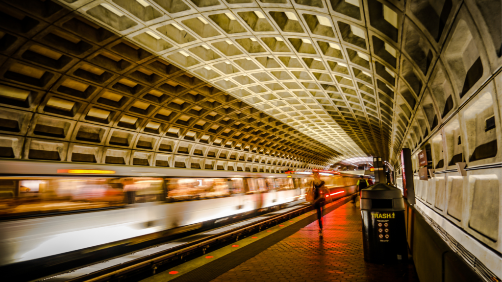 a fast-moving, blurred subway underground at DC's South Capital Metro Station