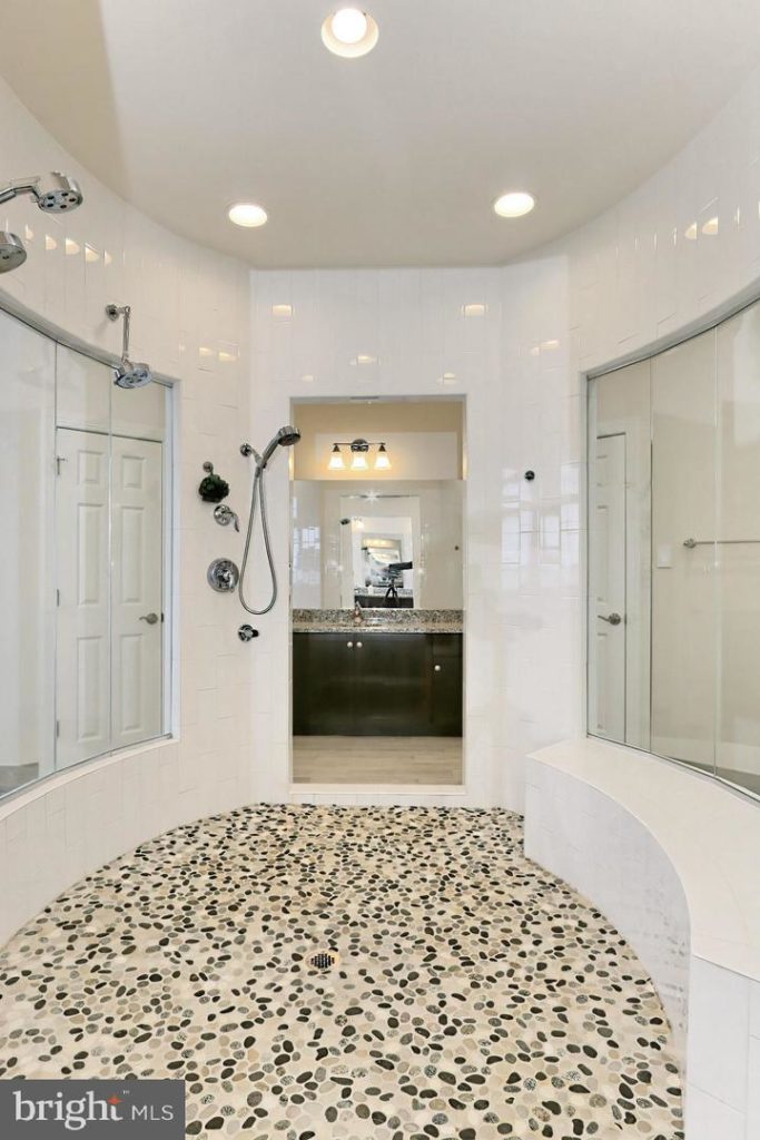 interior of walk-in shower within this luxury bathroom