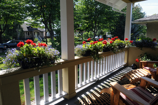 patio furniture and plants improve curb appeal